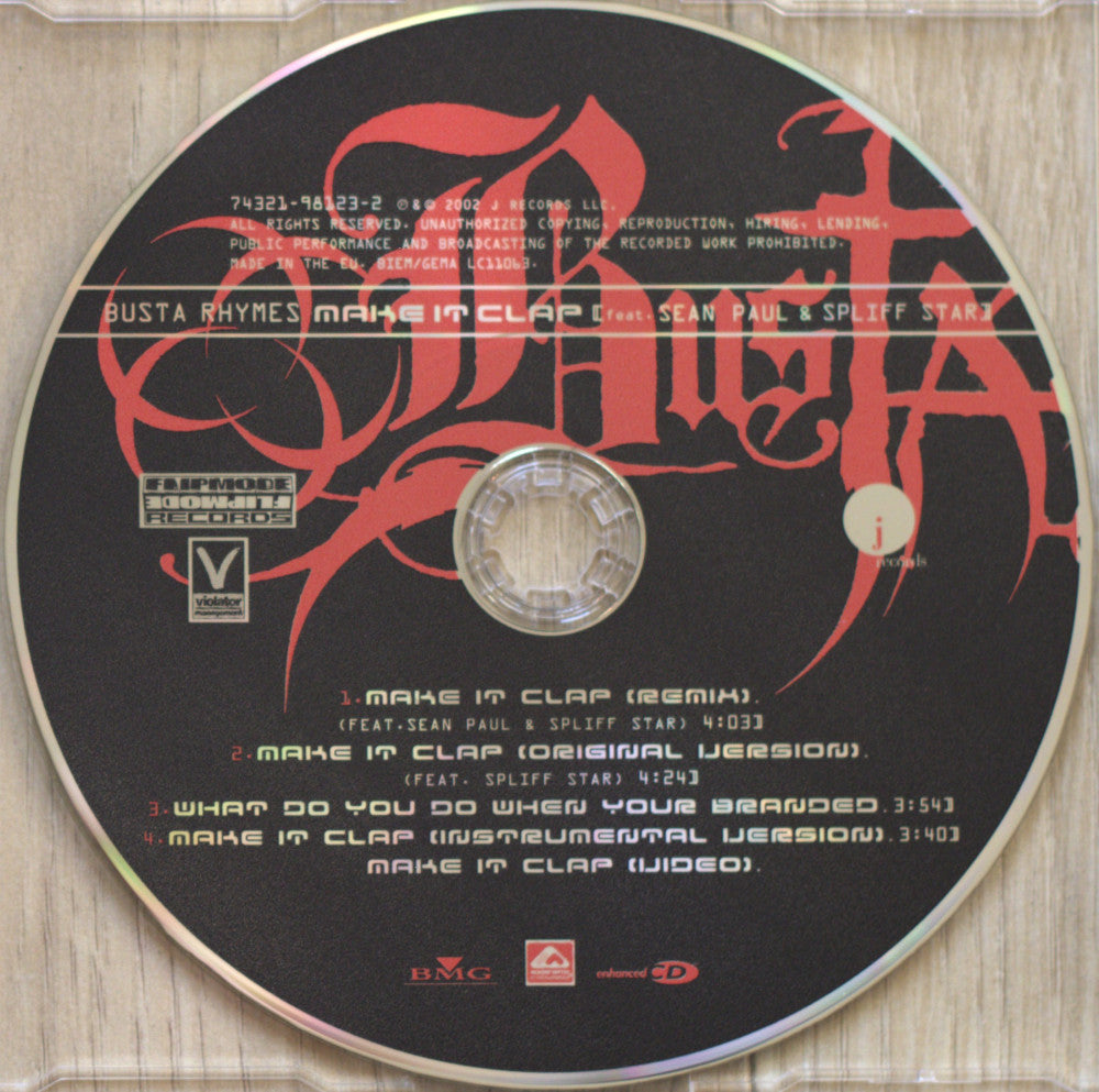 A music CD disc for 'Busta Rhymes Make It Clap' by Sean Paul & Spliff Star, featuring a black disc with red gothic lettering and tracklist text, photographed inside a clear jewel case on a light wood surface.