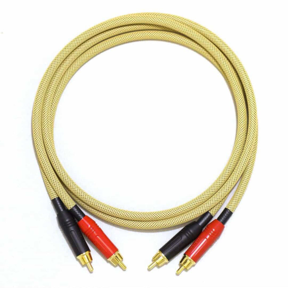 Coiled audio cable with red and black plugs on a white background