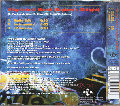 The back cover of a music album titled 'Step Into A World (Rapture's Delight)' featuring track listings, credits, and Zomba branding on a dark blue textured background.
