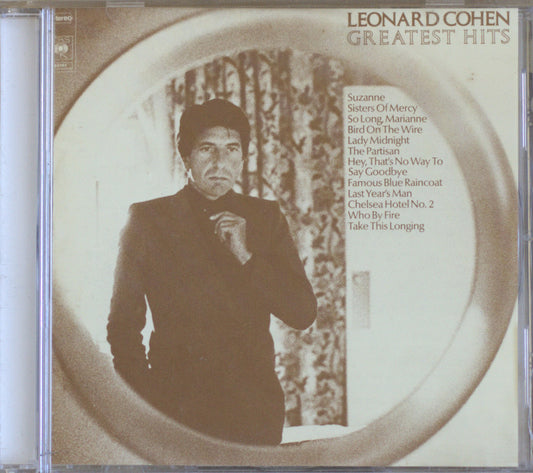 Leonard Cohen Greatest Hits CD album cover, showing a sepia-toned portrait of Leonard Cohen inside a circular frame, with the album title and track list printed on the right.
