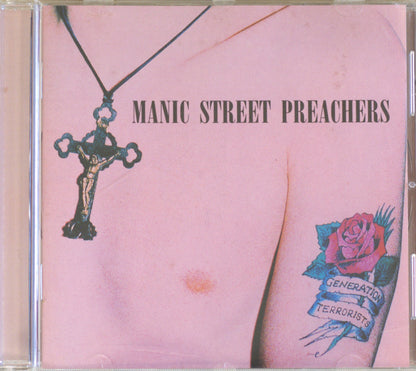 CD cover for the album 'Manic Street Preachers' featuring a pale pink background with a crucifix pendant, a small mole, and a tattooed arm with a pink rose and banner reading 'Generation Terrorist'.