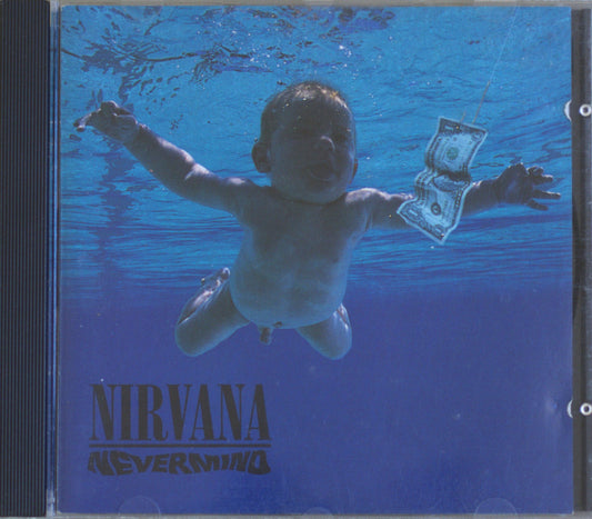 Nirvana - Never Mind album cover art showing a baby floating underwater with a dollar bill, inside a CD case.