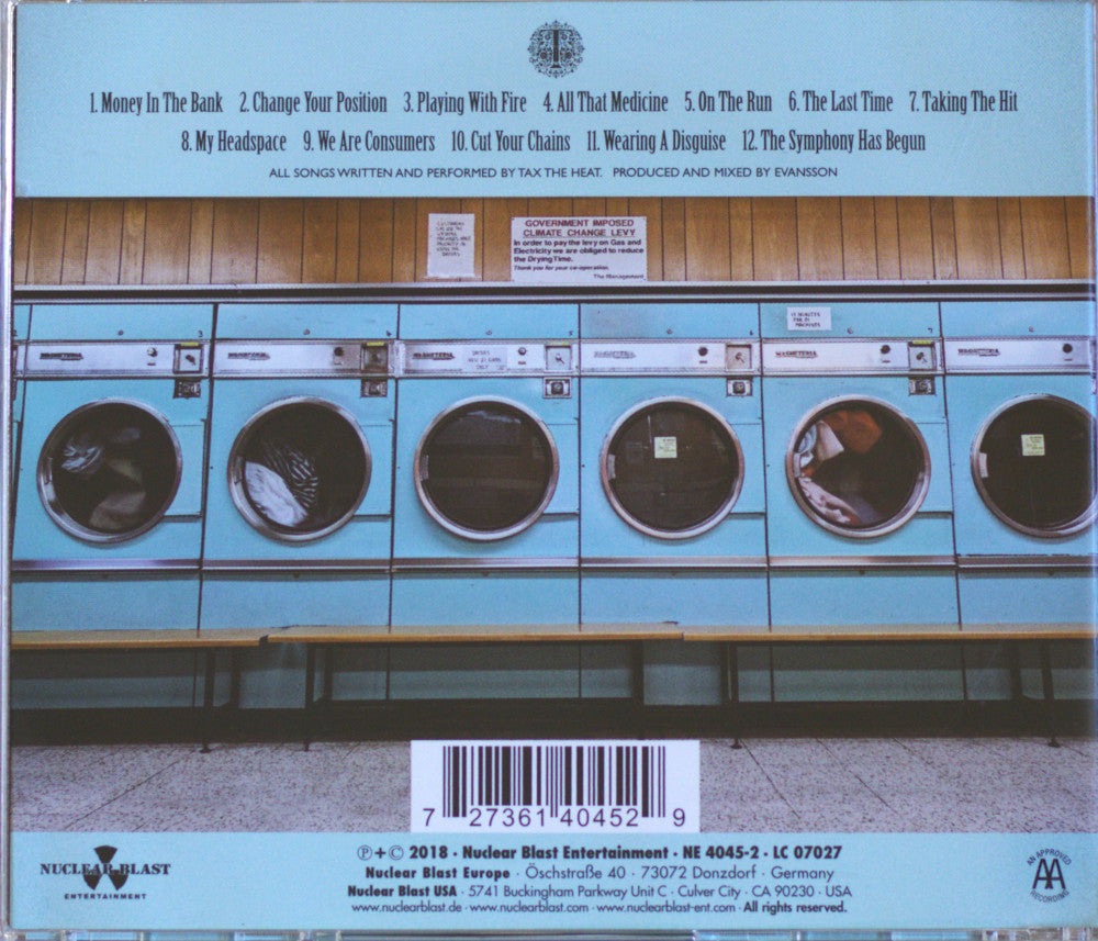 Back cover of a music CD for 'That's The Heat' by Nuclear Blast Entertainment, featuring a row of vintage light blue washing machines with a tracklist at the top and barcode at the bottom.