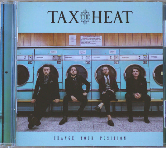 CD cover for the band TAX THE HEAT's album 'CHANGE YOUR POSITION', featuring a photo of four men sitting on a bench in front of turquoise laundries.